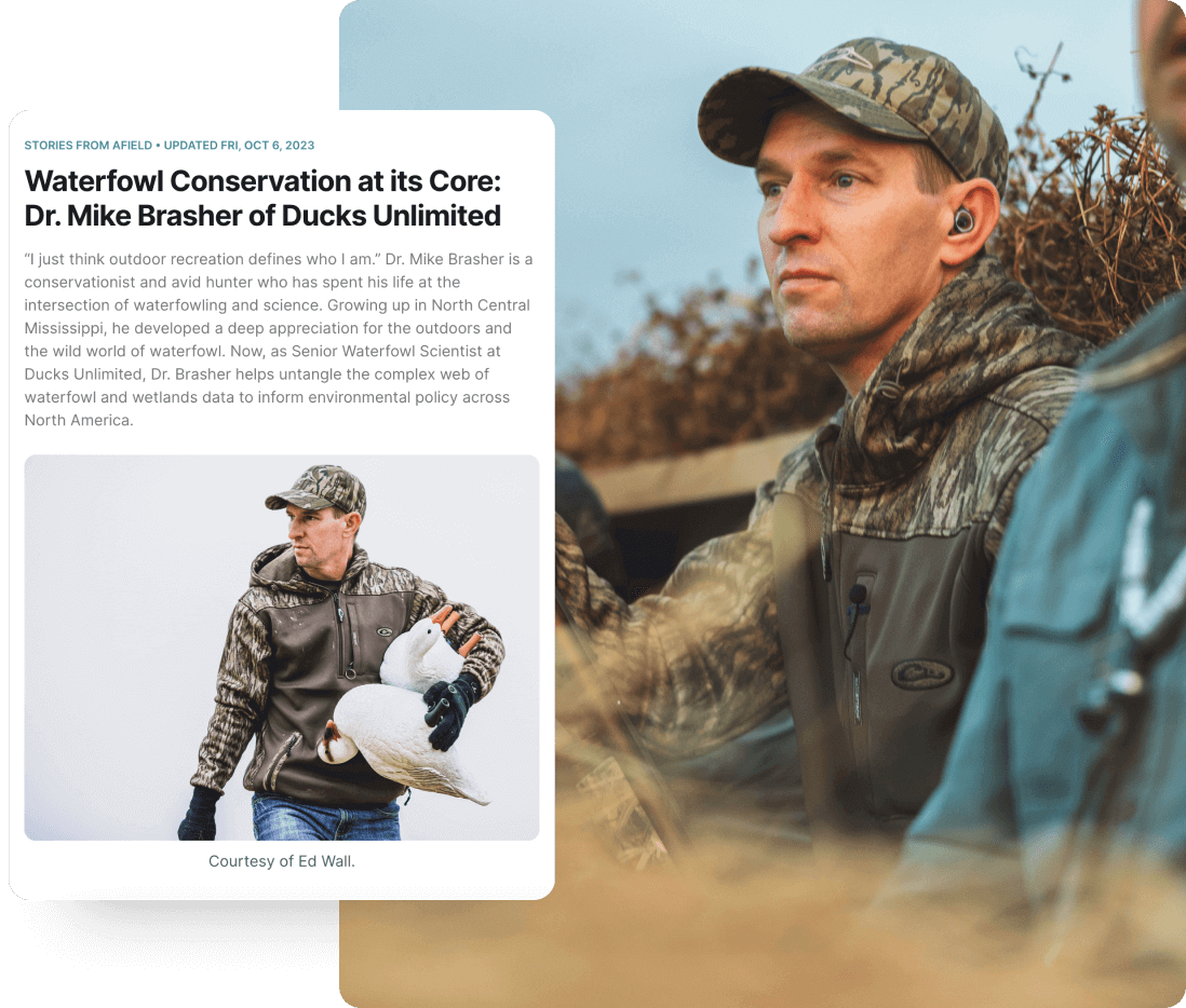 An article titled "Waterfowl Conservation at its Core: Dr. Mike Brasher of Ducks Unlimited" over an image of Dr. Mike Brasher in full hunting gear.